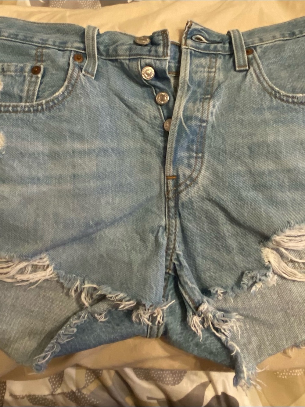 Levi's 501 light blue denim shorts with white pocket lining